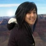 Thi smiling with Grand Canyon in the background