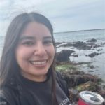 Dyana Peña in front of the ocean